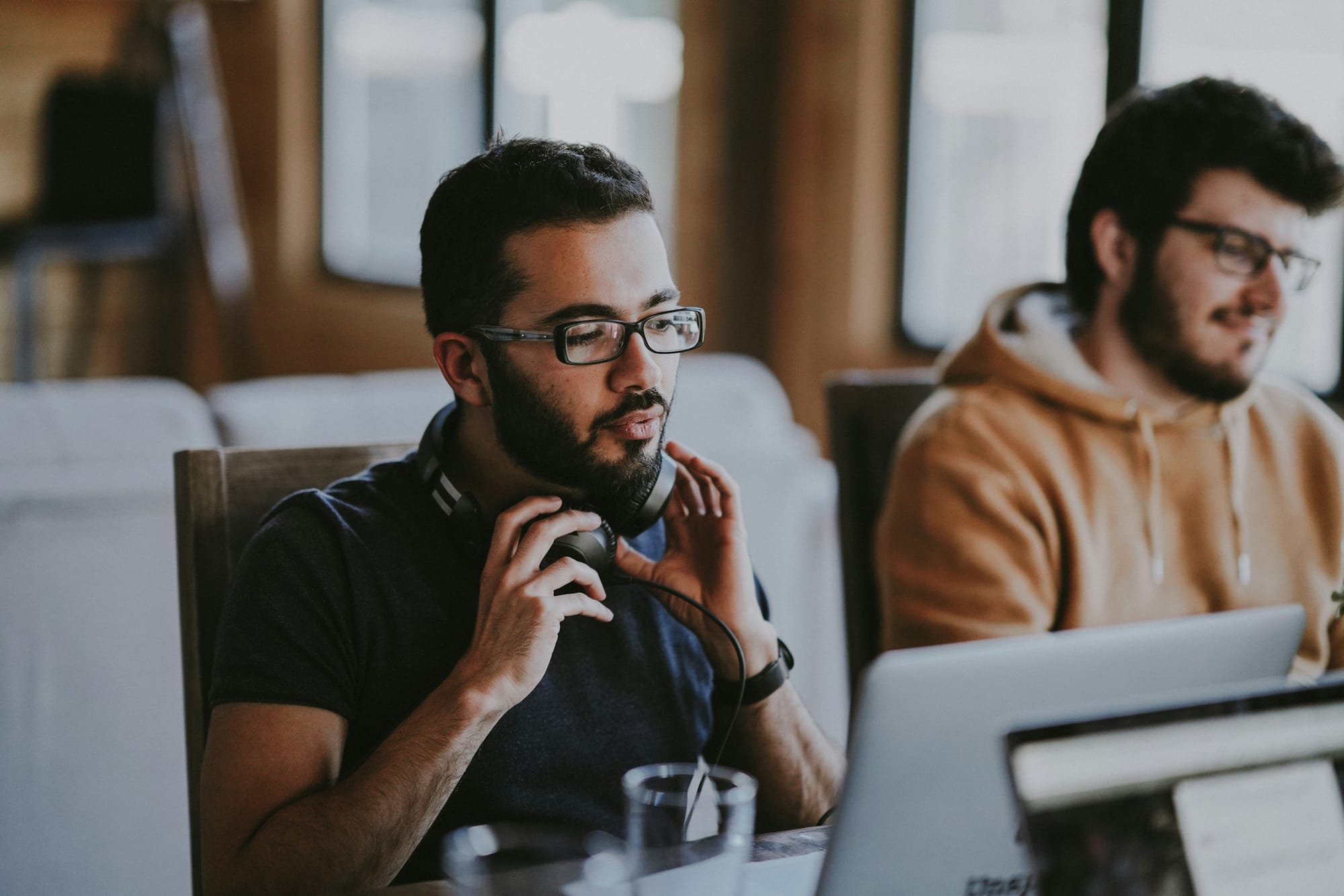 man on a desktop -  Fliki Alternatives
