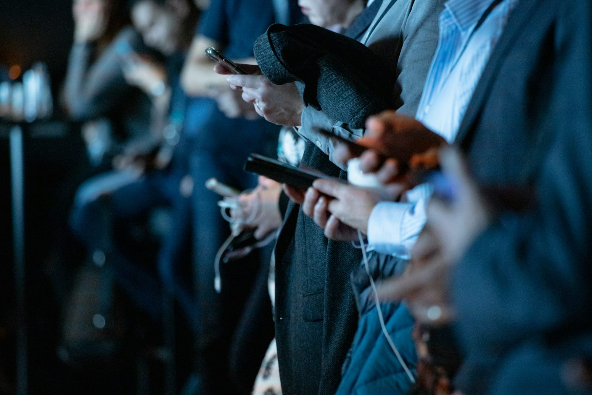 People Holding Phone - How To Make Money On Social Media