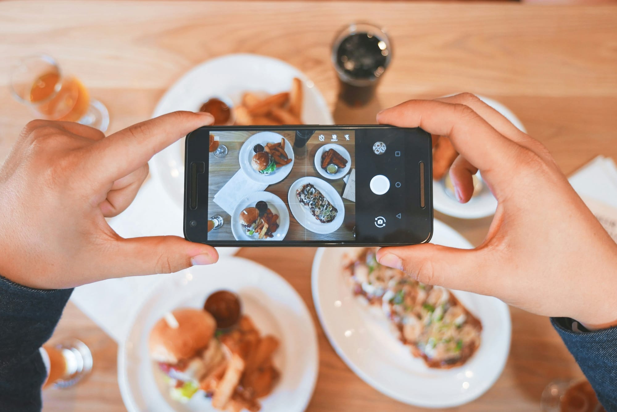 man recording a video - Social Media Video Marketing Strategy