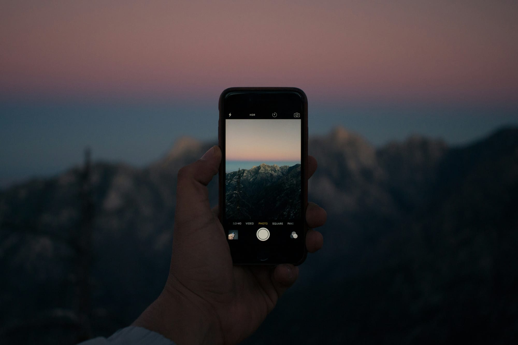 Person capturing with Phone- Filmora Vs iMovie