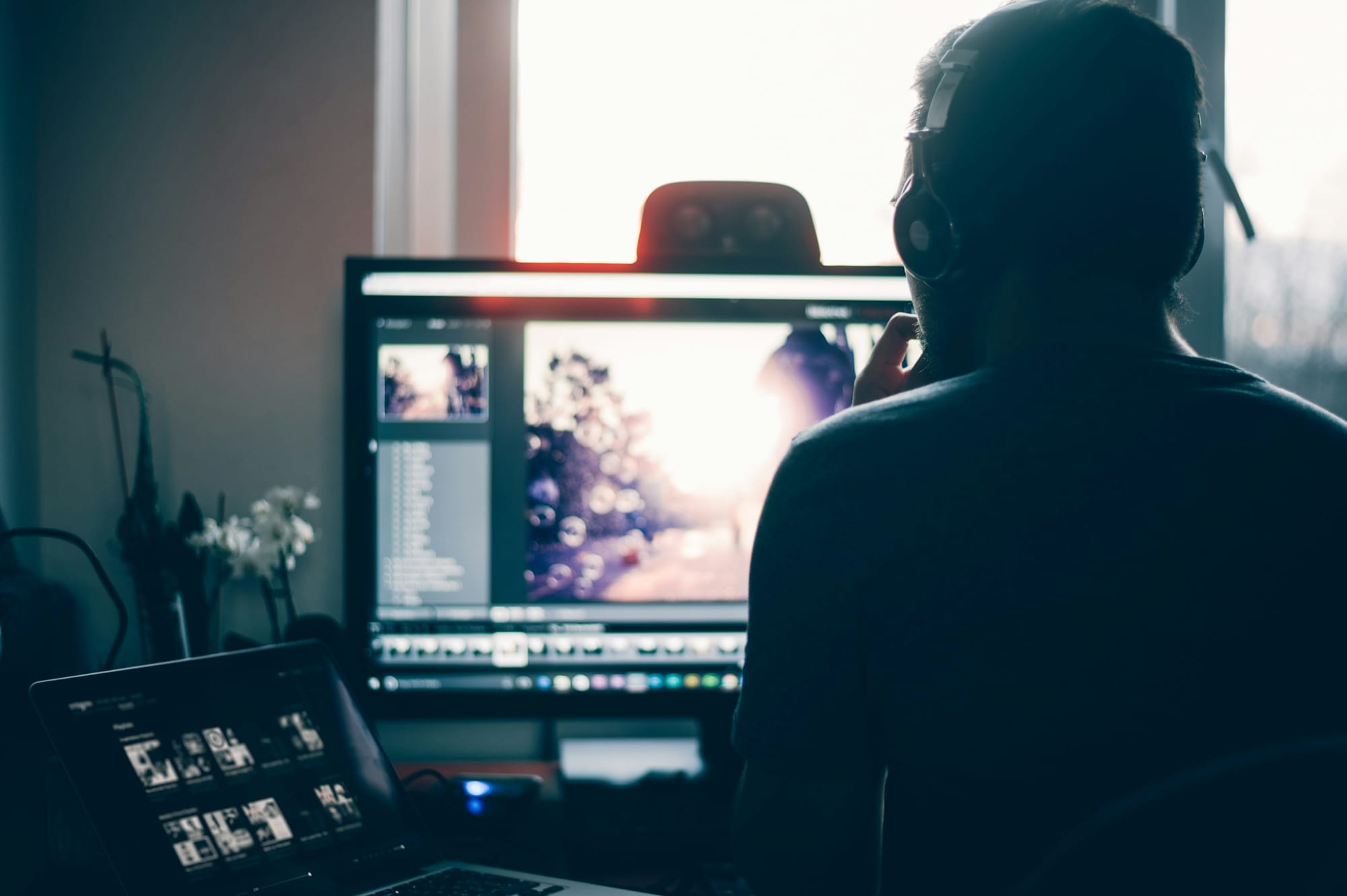 man on a computer -  How To Create Video Content For Social Media