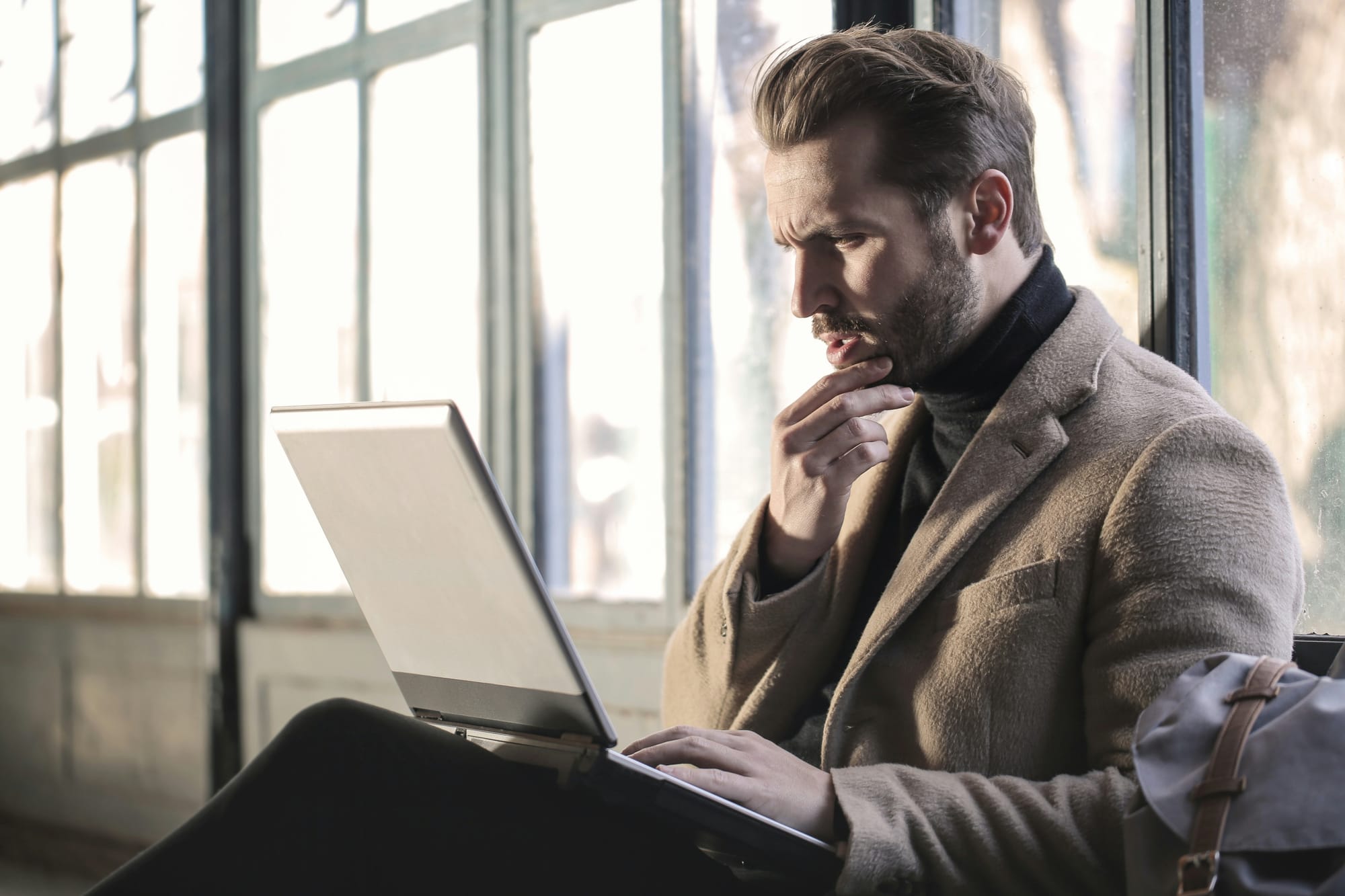 man thinking about using CapCut Alternatives