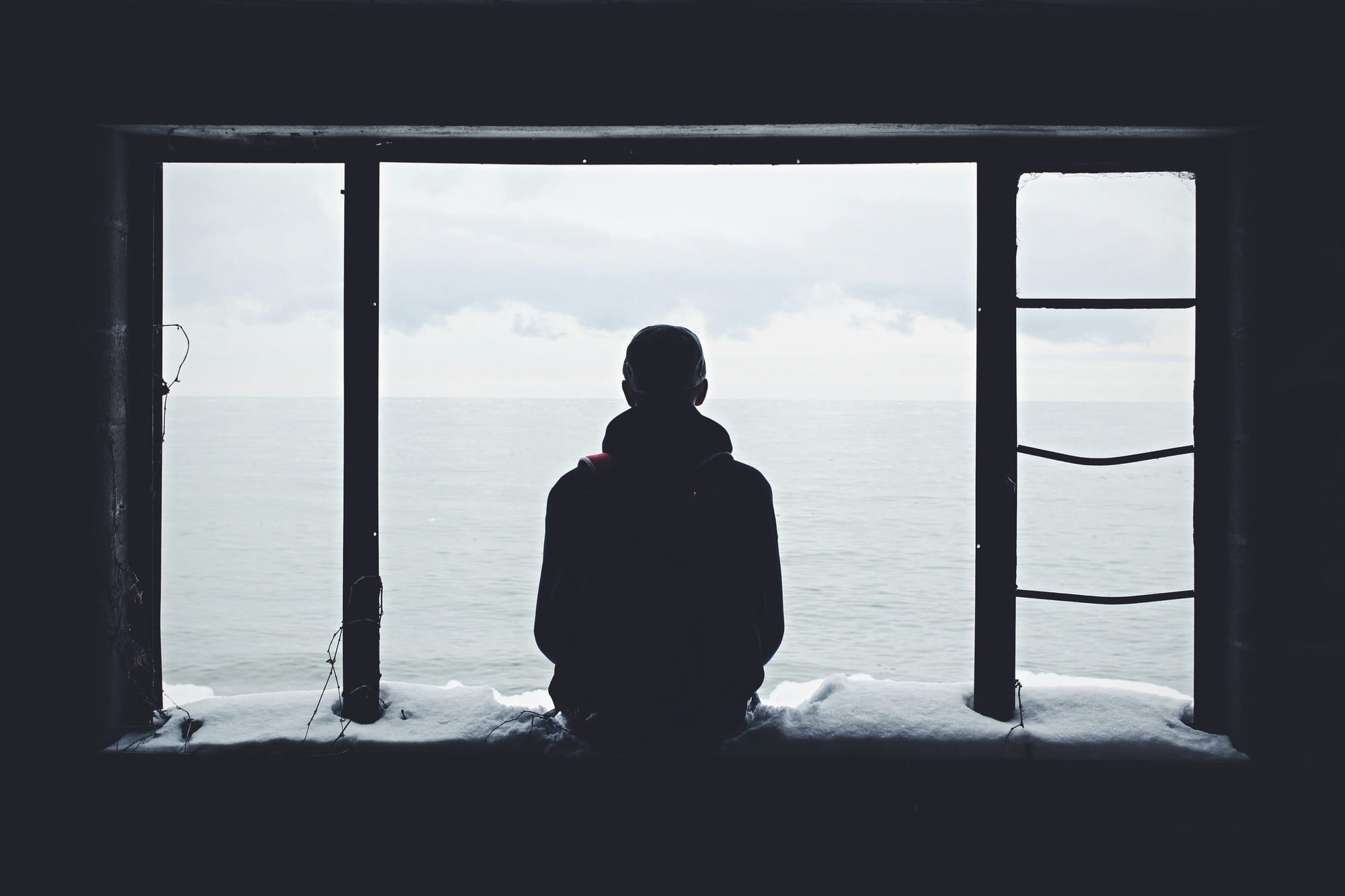 sad person by the window - Tiktok Caption Ideas