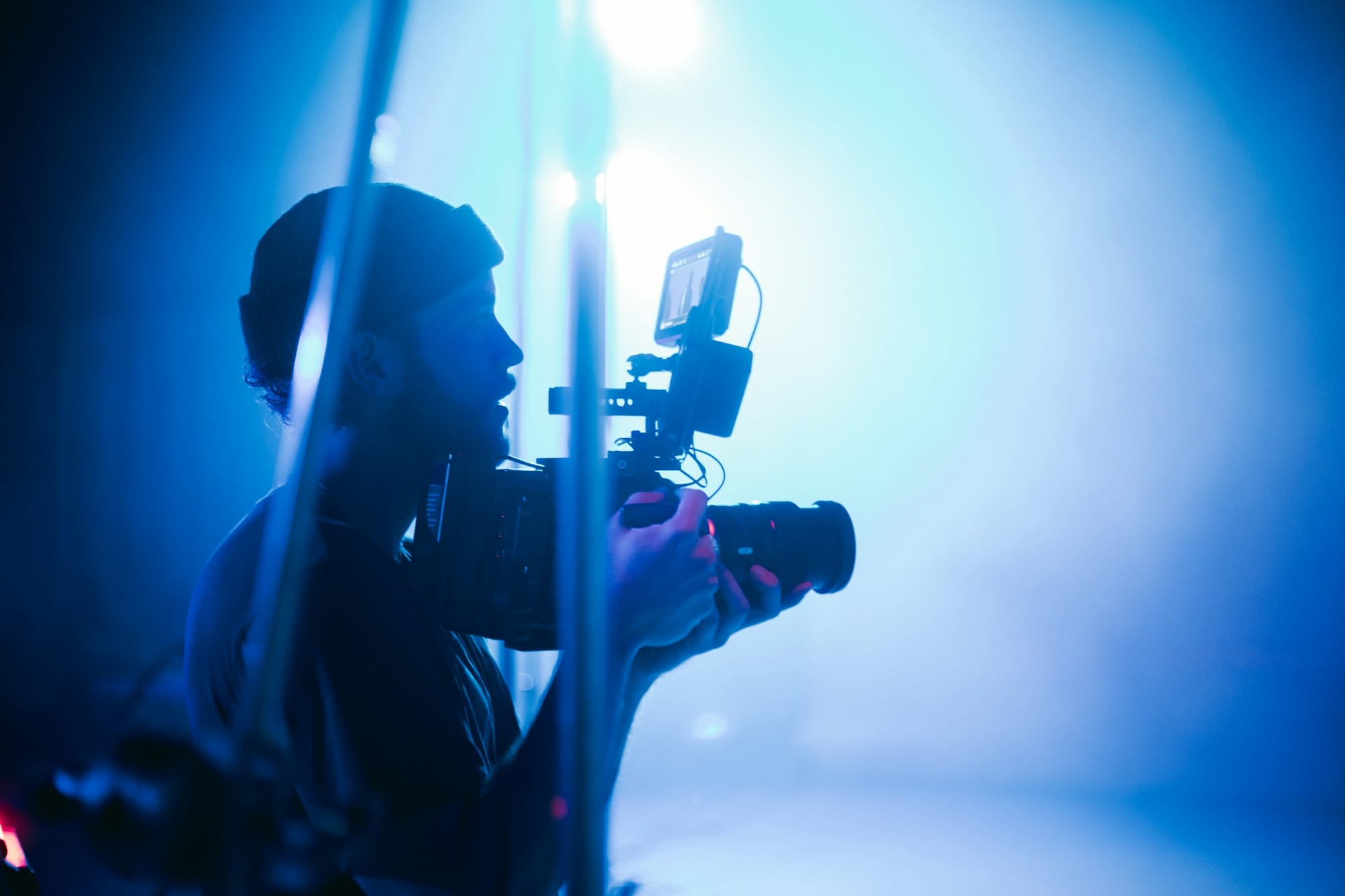 man with a camera - Steps for Successful Social Media Video Marketing Strategy
