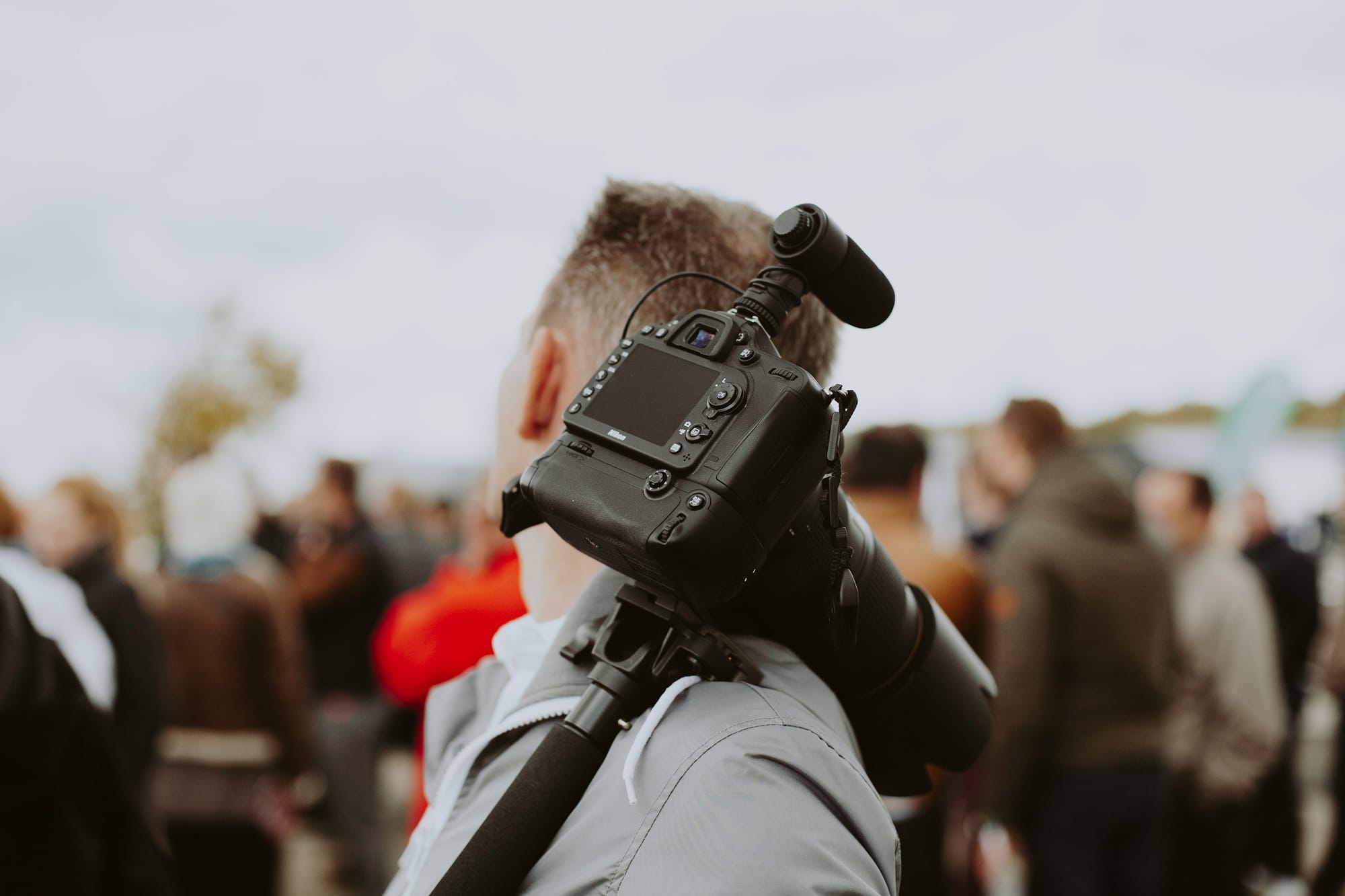 man with a camera - Social Media Video Marketing Strategy