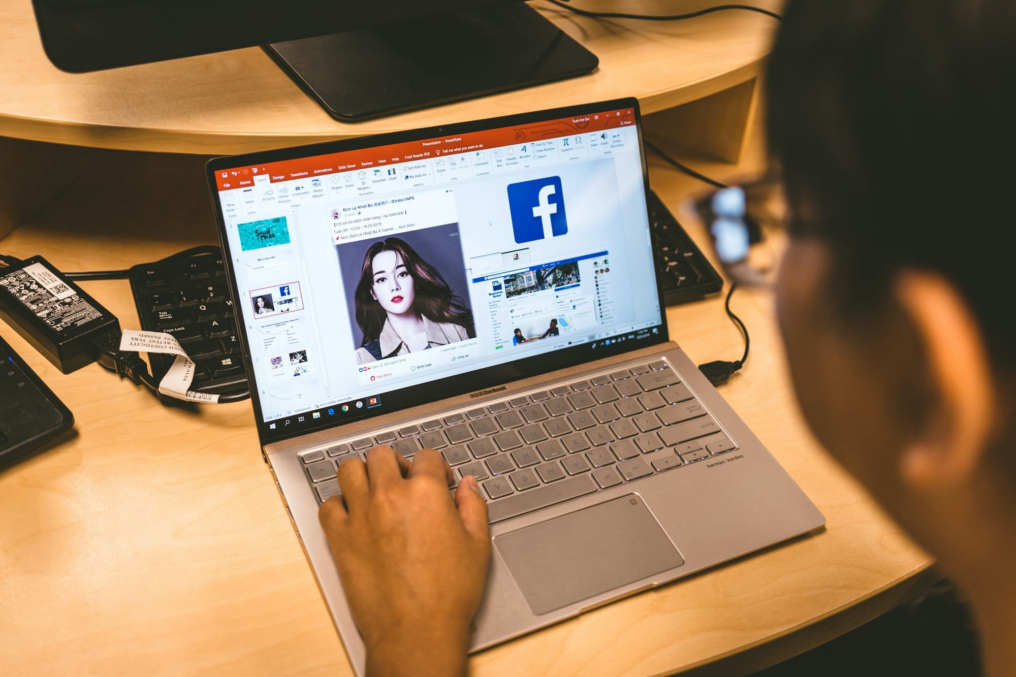 Person Working on Laptop - Popular Hashtags for Facebook Reels