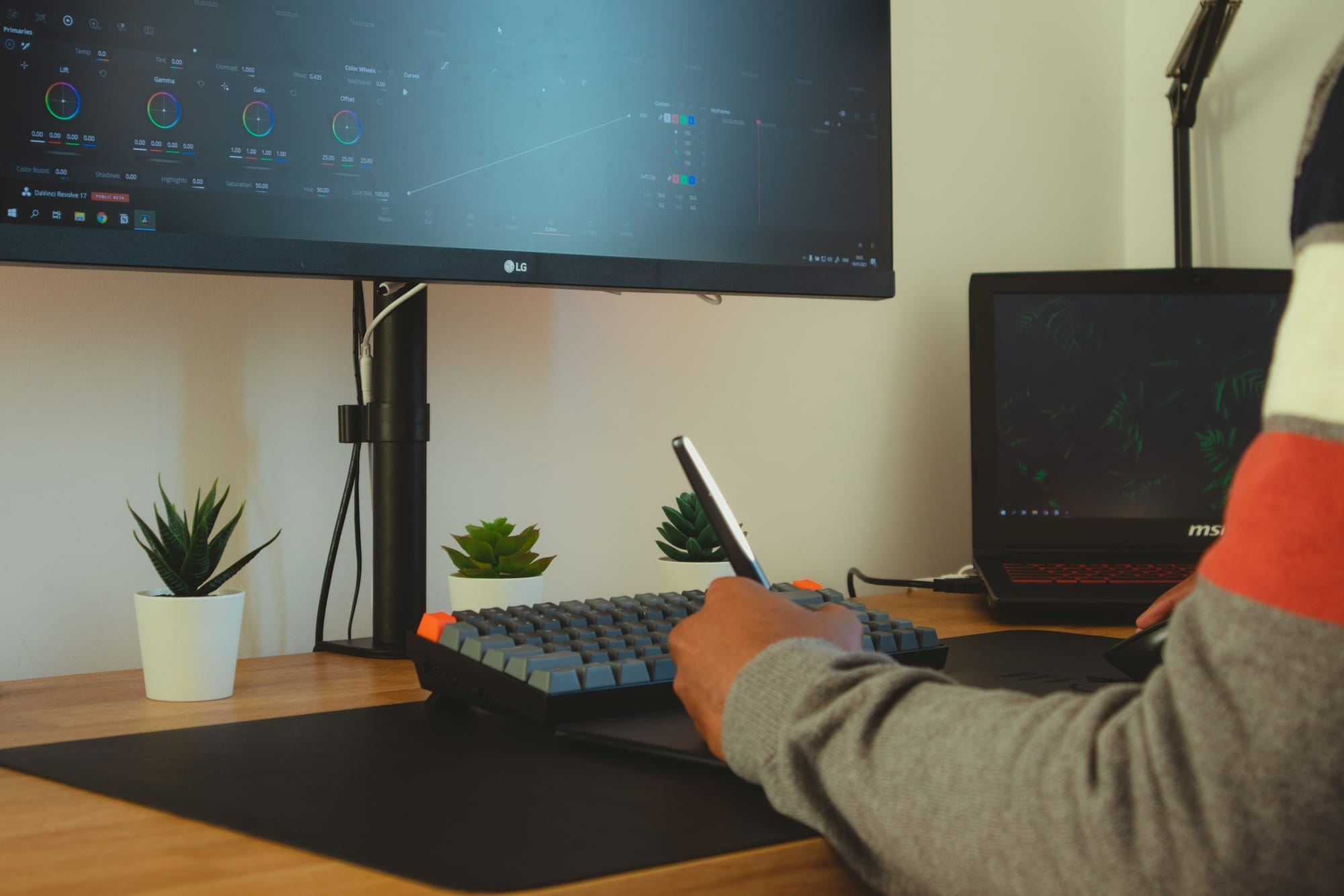 man on a desktop - Wondershare Filmora Alternatives