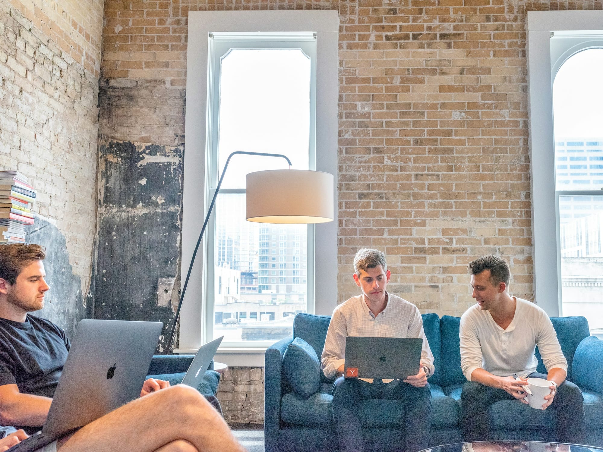 team sitting in a discusion - Short Form Content Agency