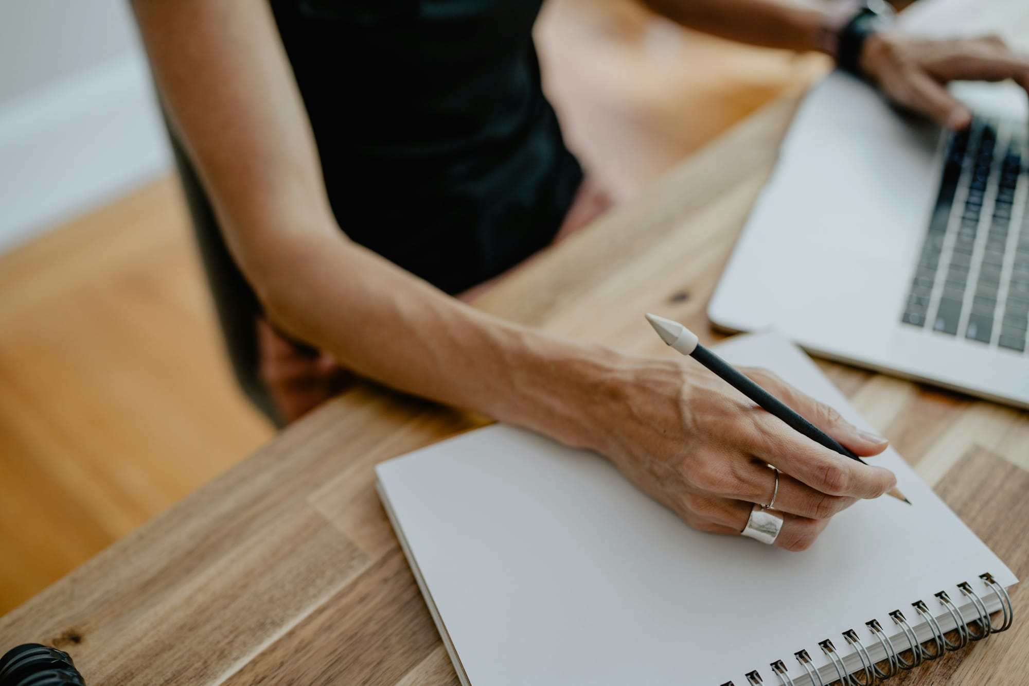 woman making notes - What Makes Online Content Go Viral