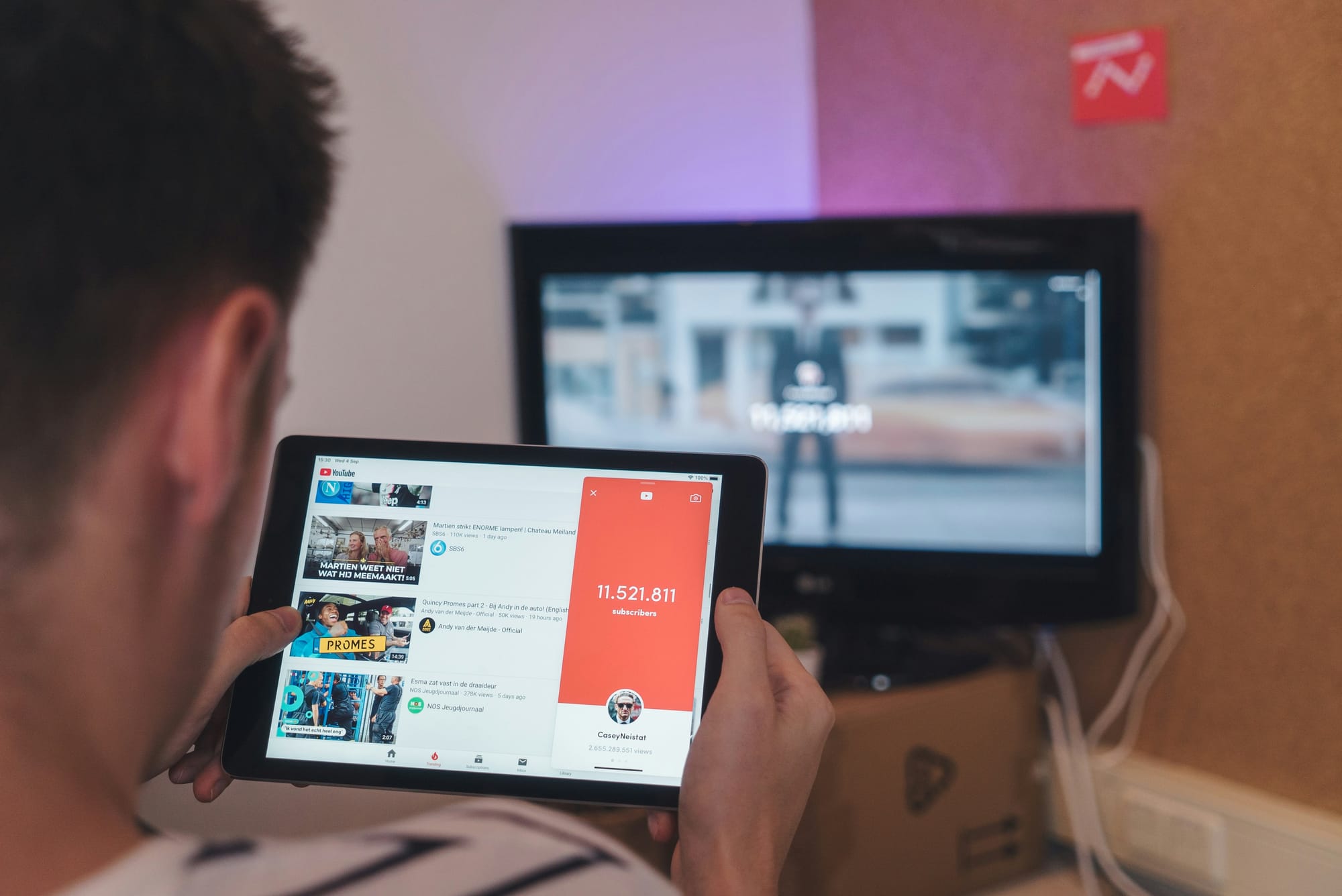 person looking at his youtube channel - Youtube Vs Tiktok Money