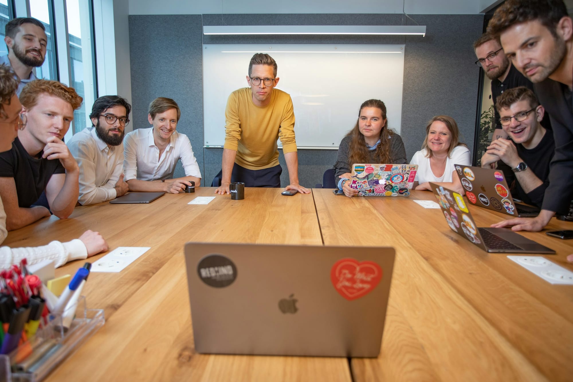 employees in a meeting - YouTube Marketing for Small Business