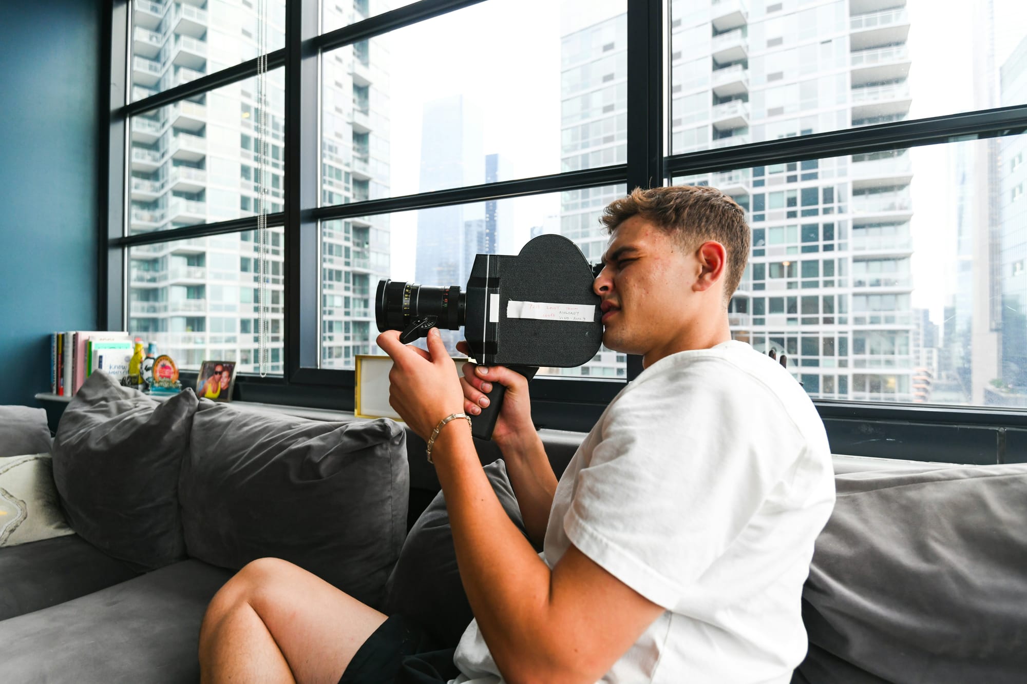 person with a big camera - How To Make A TikTok Video
