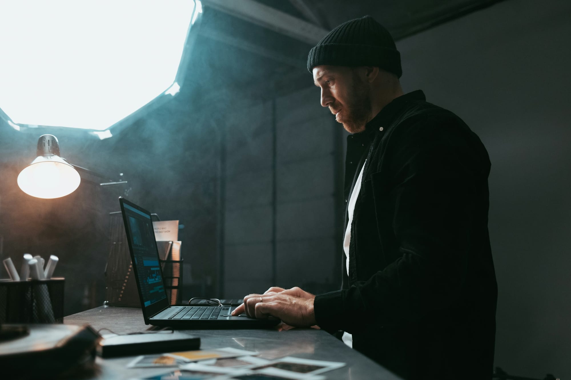 man sitting alone and working - Video Content Creator