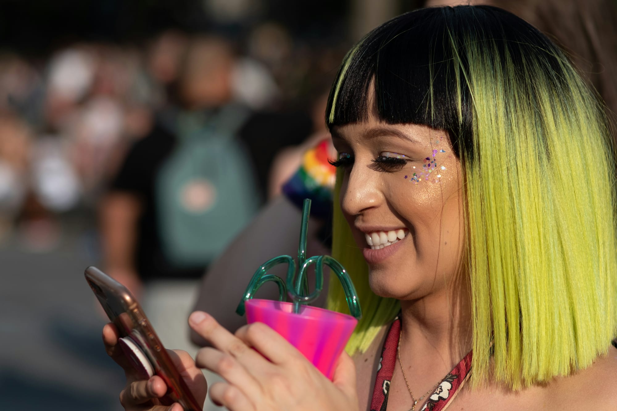 woman laughing with mobile on hand - Tiktok Caption Ideas
