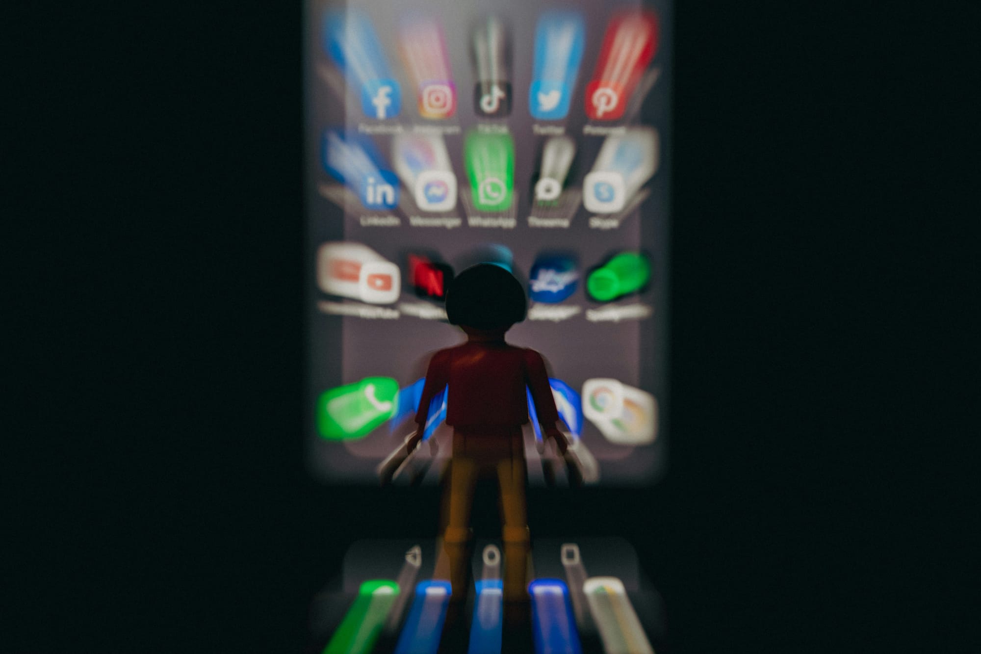 person looking at mobile apps - Tiktok Vs Youtube Shorts