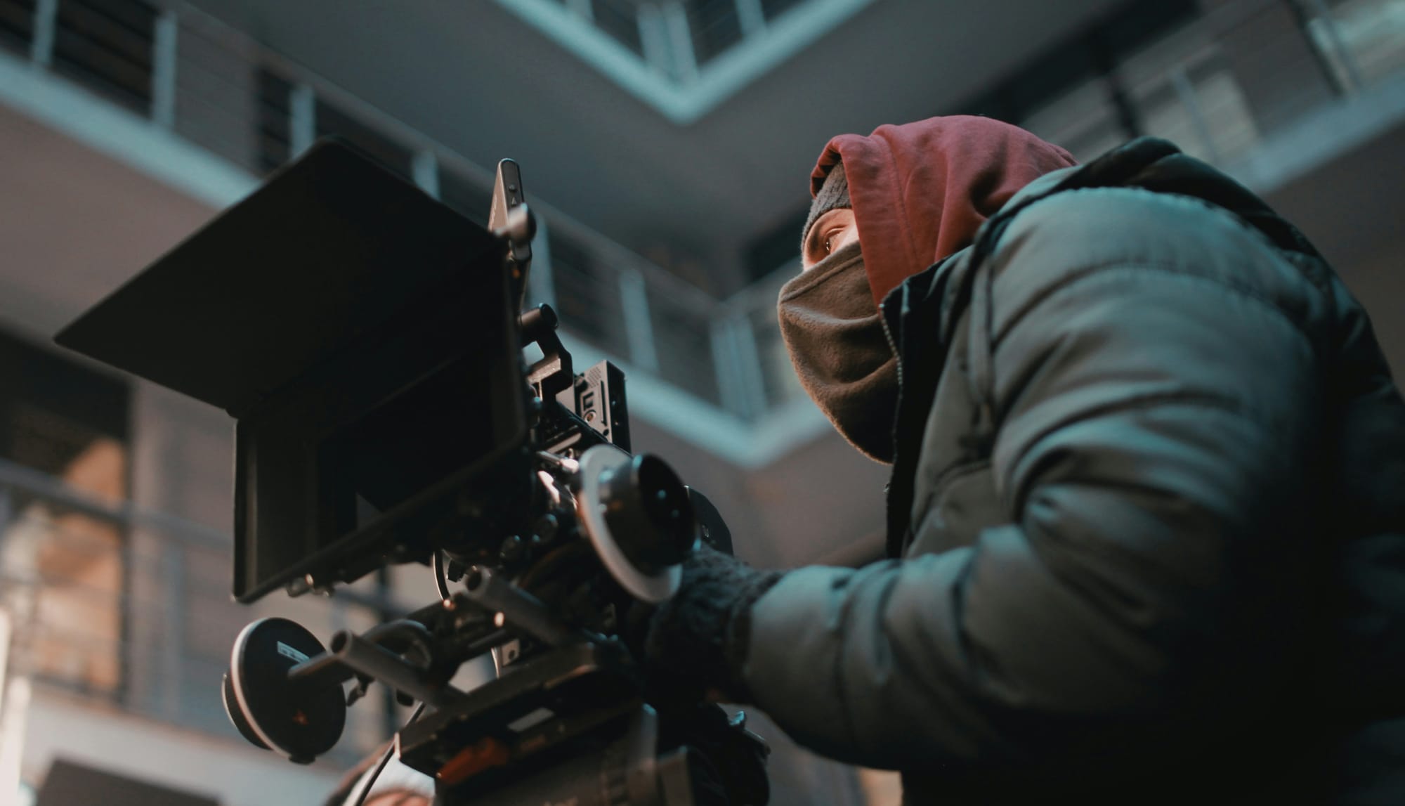 person holding a camera - CapCut Alternatives