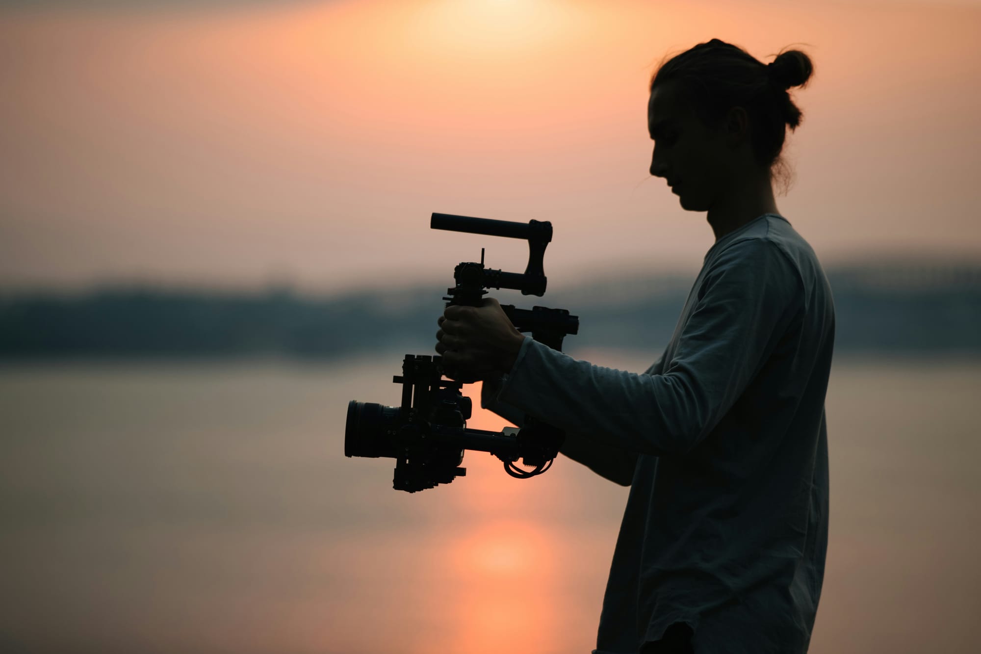 woman with a camera - How To Do Transitions On TikTok
