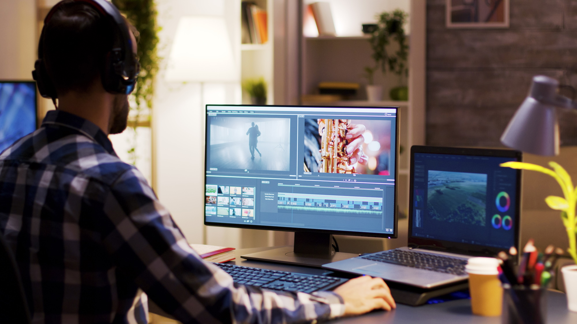 person editing a software - Best Video Editing App for PC