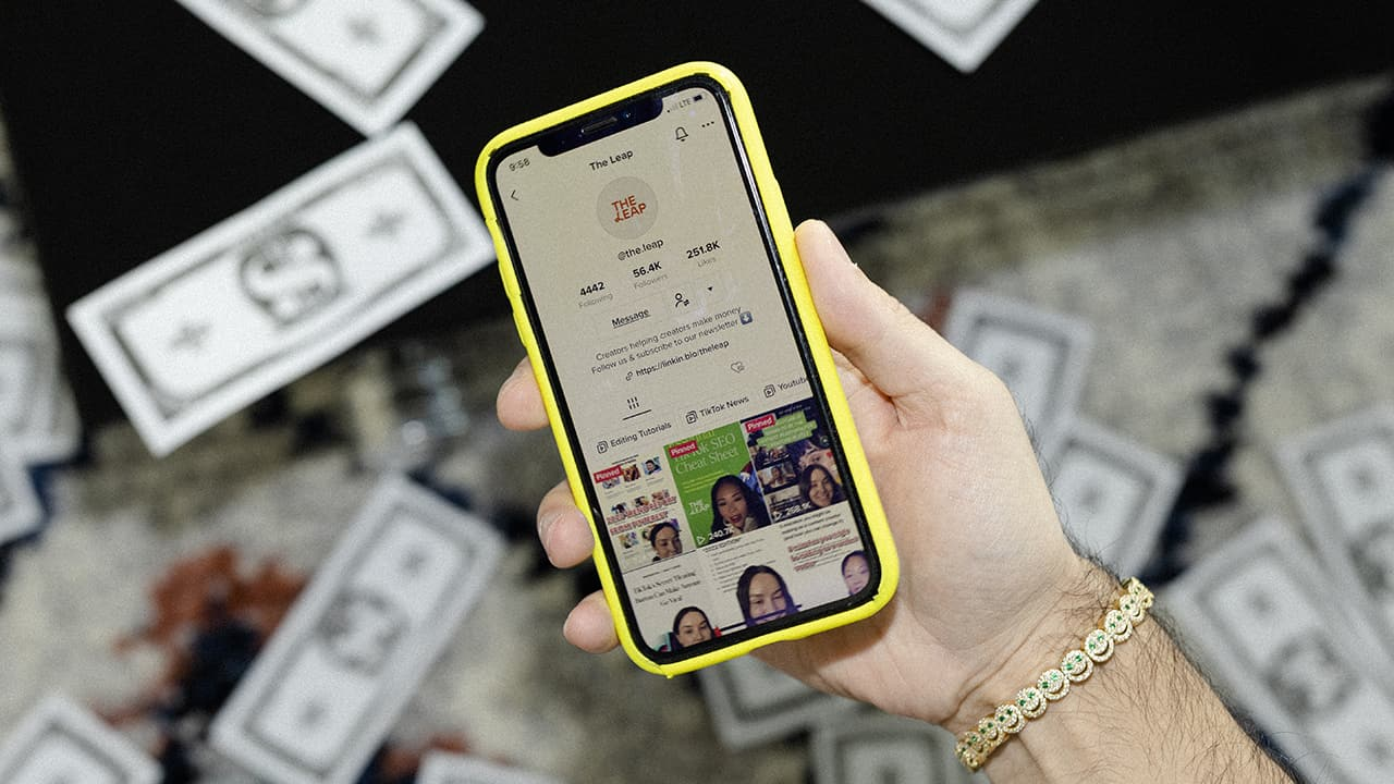 man using tiktok - TikTok Creator Program Requirements
