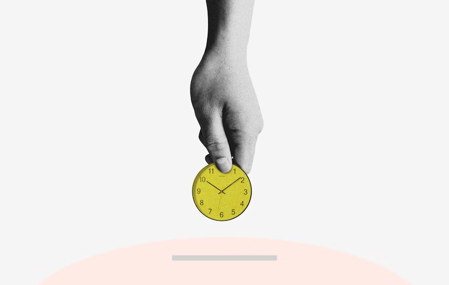 person holding a clock - Best Time to Post Reels on Instagram